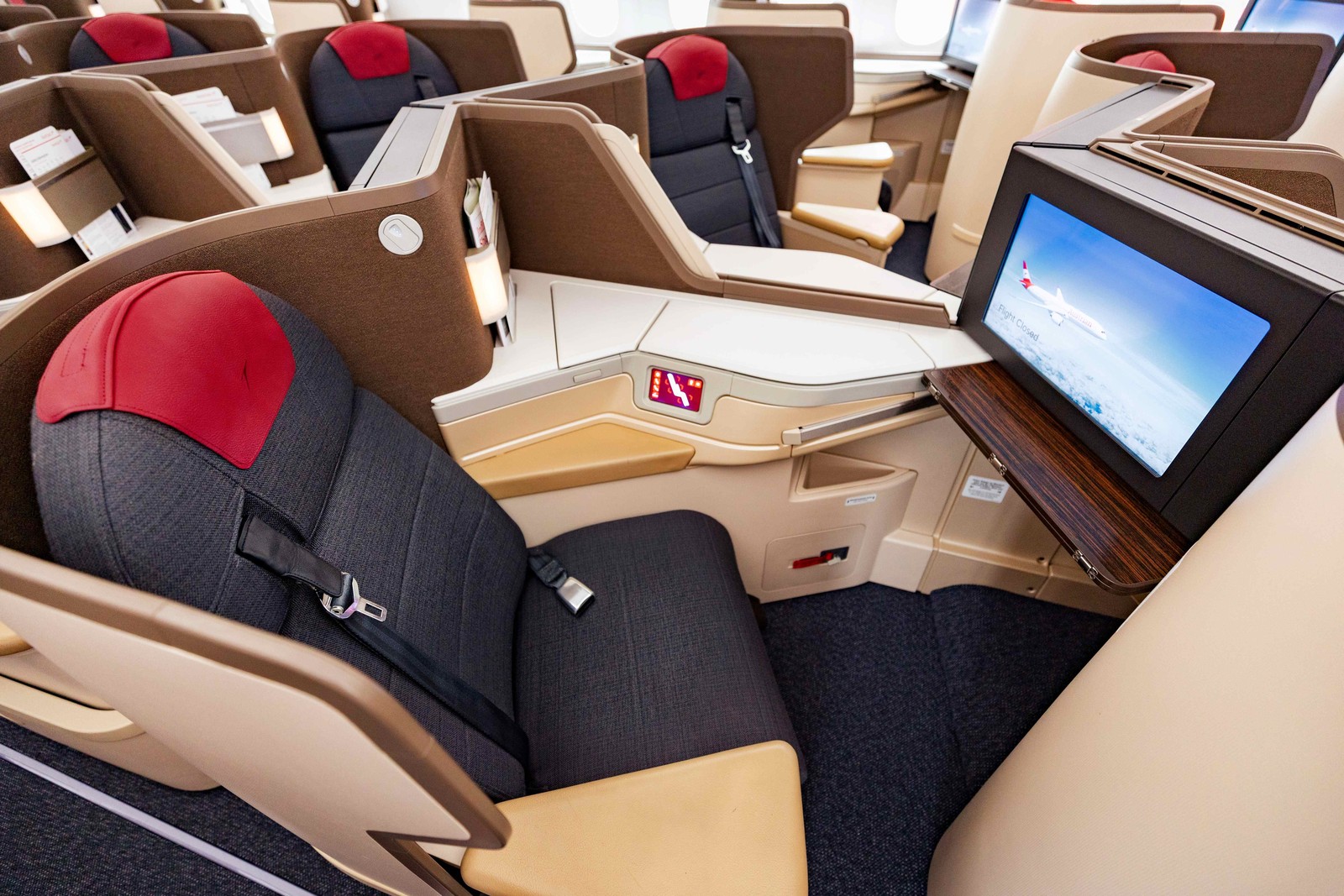 Lie-flat Business Class seat on the Austrian Airlines Boeing 787 Dreamliner, designed for restful long-haul travel. Photo by Austrian Airlines.