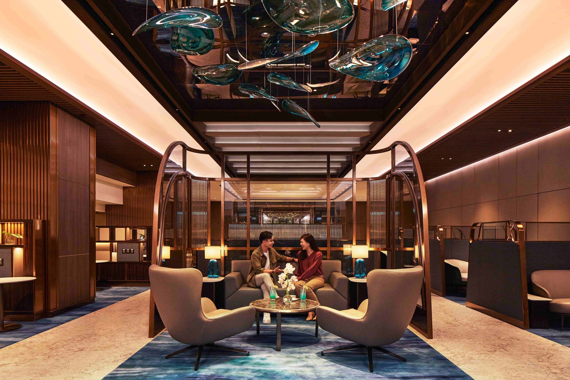 Singapore Airlines The Private Room at Changi Airport, exclusive seating area with elegant decor and cozy atmosphere. Photo by Singapore Airlines.