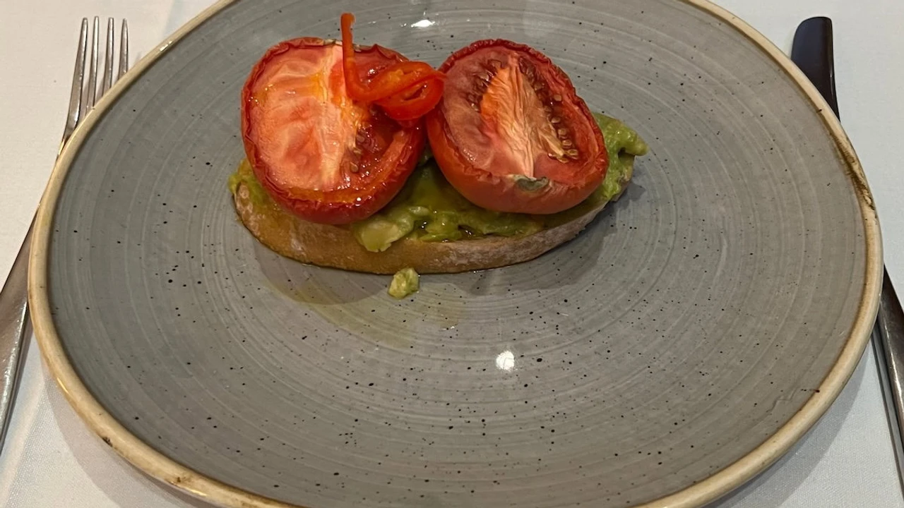 California avocado and roasted tomato toast on sourdough served at Concorde Dining