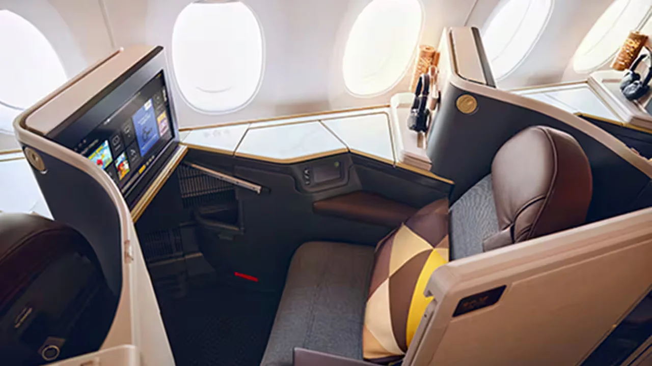 Etihad's door-equipped reverse herringbone — proof that you can have privacy without sacrificing cabin density